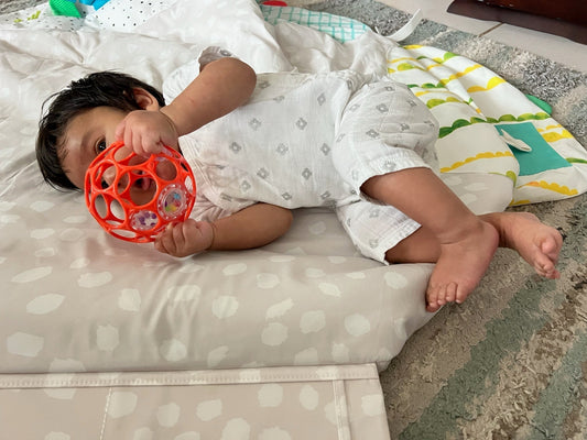 a baby starting to roll