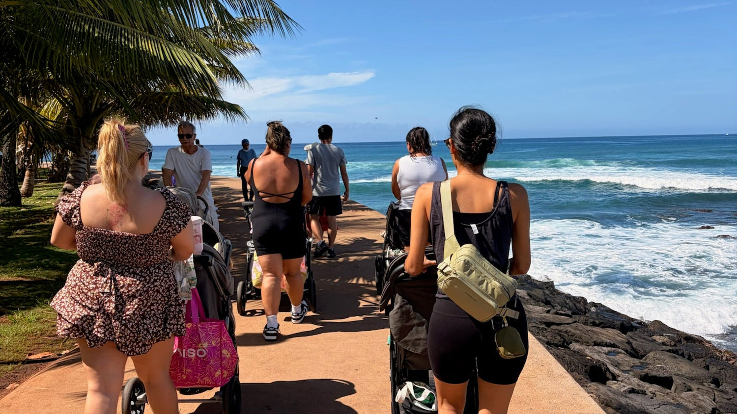 moms walking together at magic island beach park