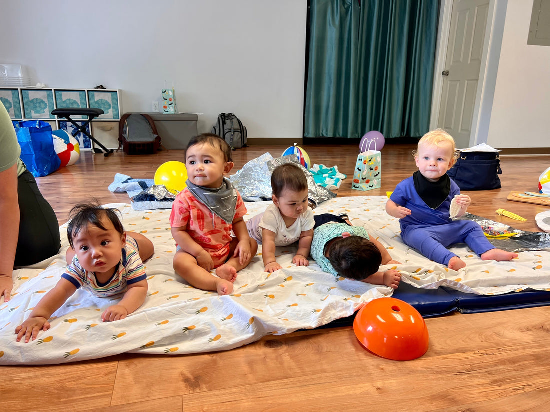 a group of babies on the floor